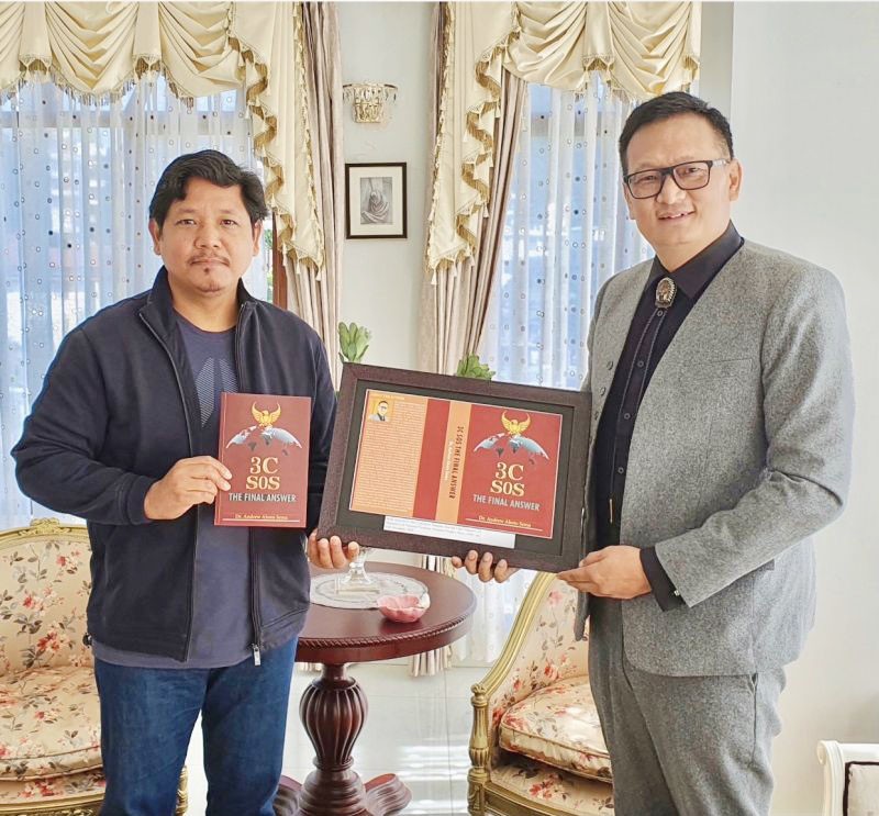 Meghalaya Chief Minister releasing the book '3C SOS – The Final Answer' authoried by Dr Andrew Ahoto Sema on November 14.